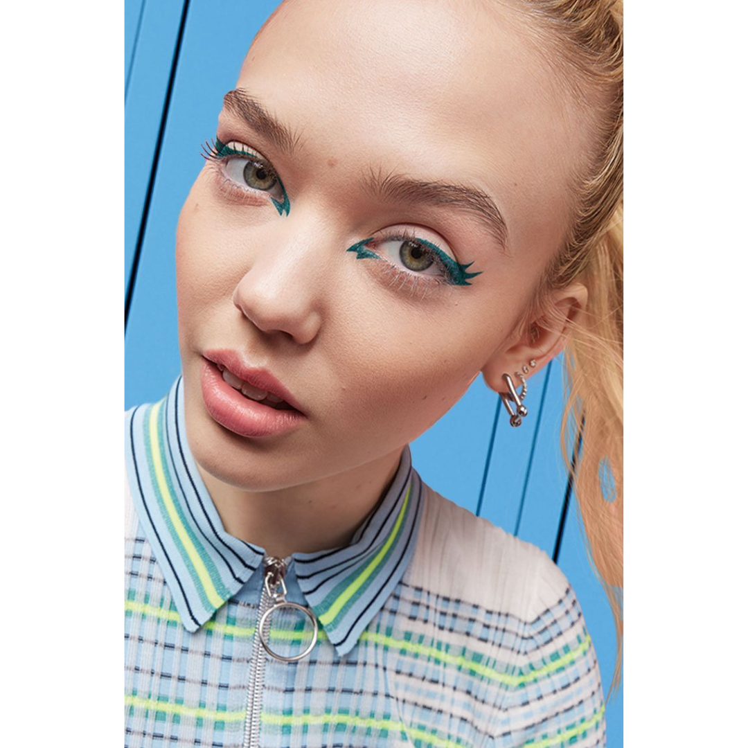 Maybelline Master Precise Liquid Eyeliner applied on a model’s eyes, highlighting clean, sharp lines and precise winged eyeliner definition.