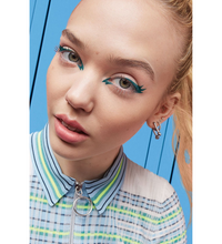 Maybelline Master Precise Liquid Eyeliner applied on a model’s eyes, highlighting clean, sharp lines and precise winged eyeliner definition.